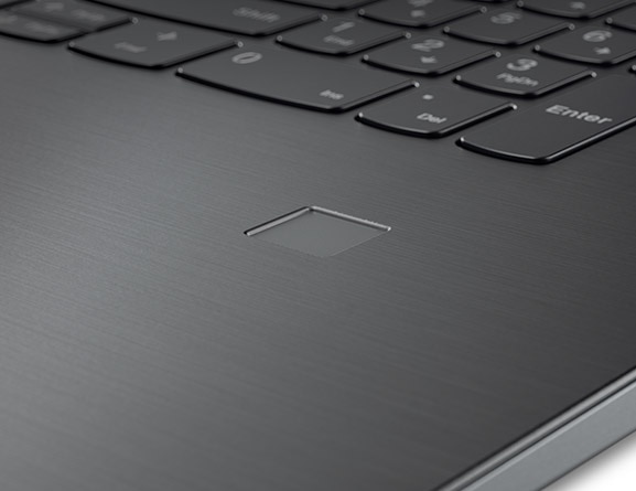 Detail of fingerprint reader on the Lenovo V320 laptop.