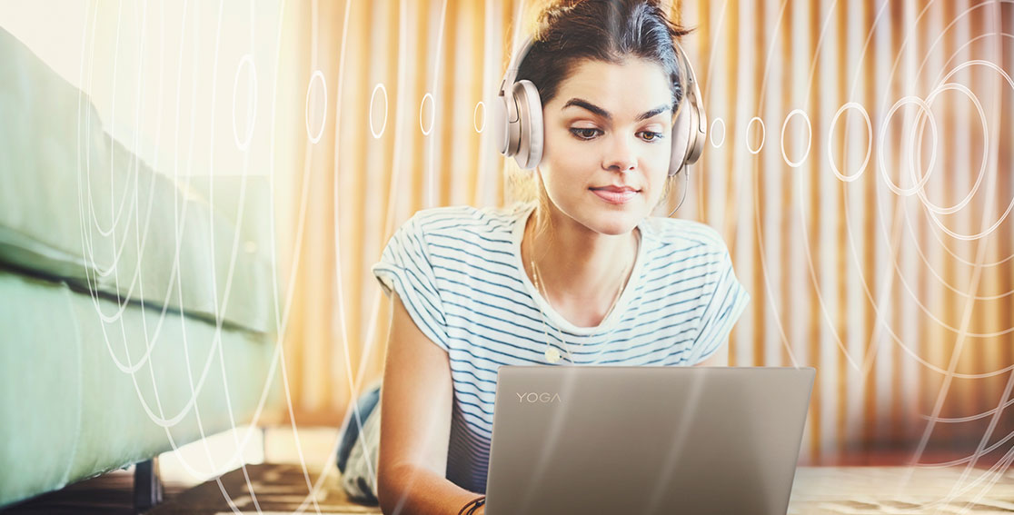 Woman listening to music on Yoga 920 (13”) 